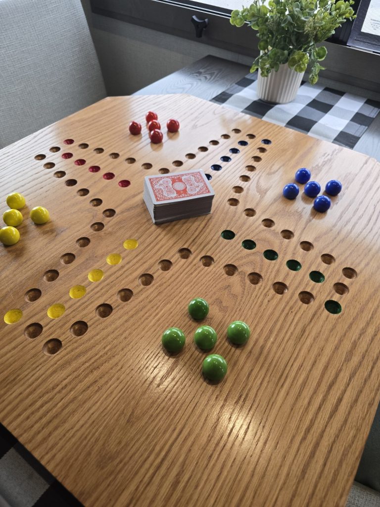 Jokers game board with cards and marbles